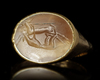 A ROMAN RING WITH AN AGATE INTAGLIO, 1ST CENTURY BC