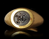 A ROMAN GOLD RING WITH A BLACK JASPER INTAGLIO, 2ND CENTURY BC