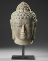 A CHINESE STONE BUDDHA HEAD, 19TH-20TH CENTURY