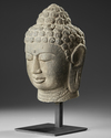 A CHINESE STONE BUDDHA HEAD, 19TH-20TH CENTURY