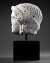 A MARBLE HEAD OF APOLLO, ROMAN 1ST CENTURY AD