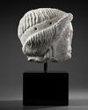 A MARBLE HEAD OF APOLLO, ROMAN 1ST CENTURY AD