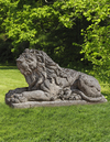 A SCULPTED LIMESTONE MODEL OF A RECUMBENT LION, SECOND HALF 20TH CENTURY
