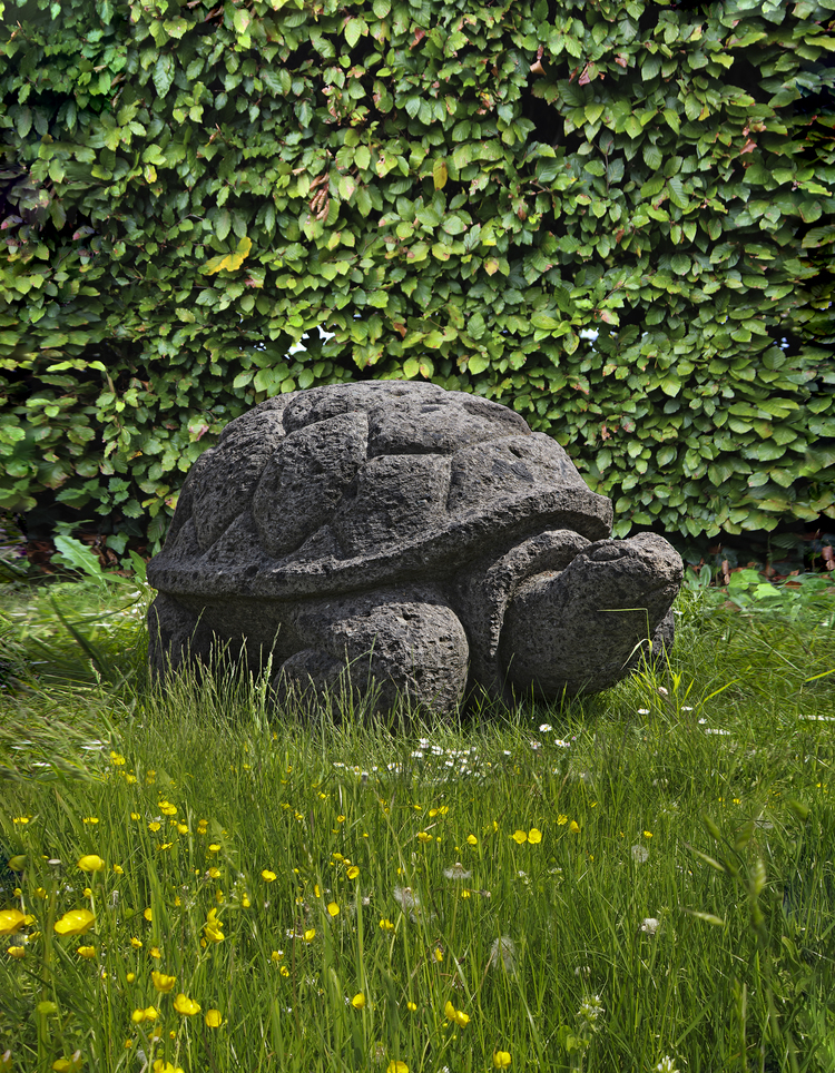 A CARVED LIMESTONE MODEL OF A GIANT TORTOISE, LATE 20TH CENTURY