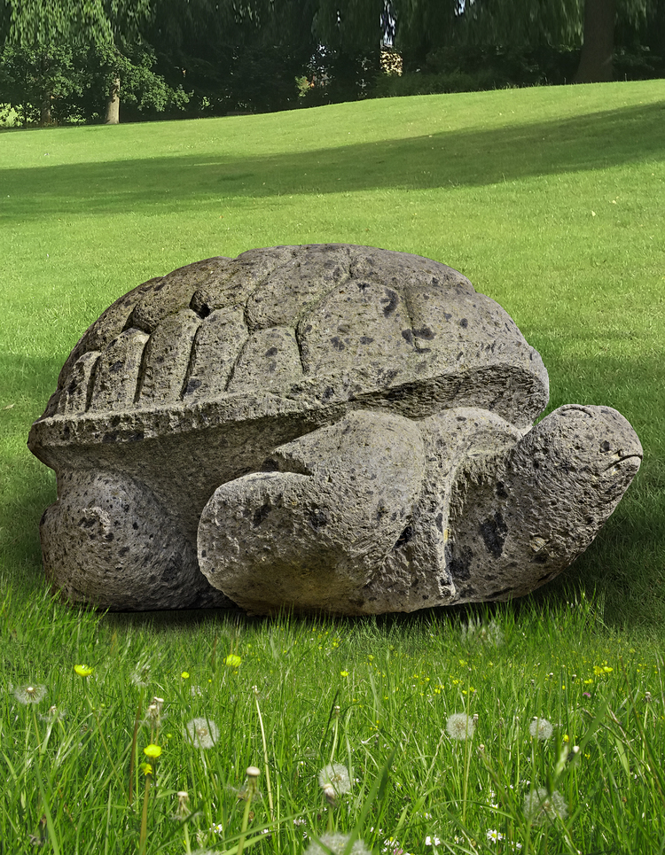 A SUBSTANTIAL LIMESTONE MODEL OF A GIANT TORTOISE, LATE 20TH CENTURY