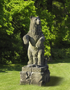 A SCULPTED LIMESTONE MODEL OF A GRIZZLY BEAR OF RECENT MANUFACTURE