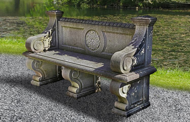 A CARVED LIMESTONE GARDEN SEAT IN LATE 18TH CENTURY FRENCH STYLE, LATE 20TH CENTURY