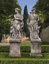 A PAIR OF SCULPTED LIMESTONE LIFESIZE FIGURES OF APOLLO AND DIANA, SECOND HALF 20TH CENTURY