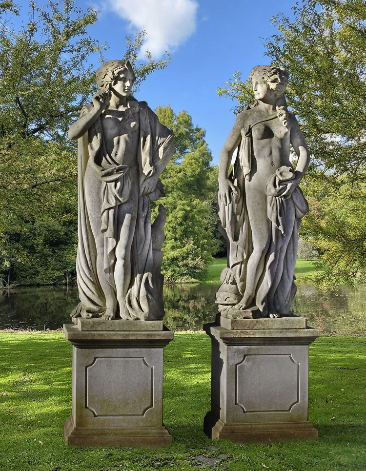 A PAIR OF SCULPTED LIMESTONE LIFESIZE FIGURES OF MINERVA AND JUNO, LATE 20TH CENTURY