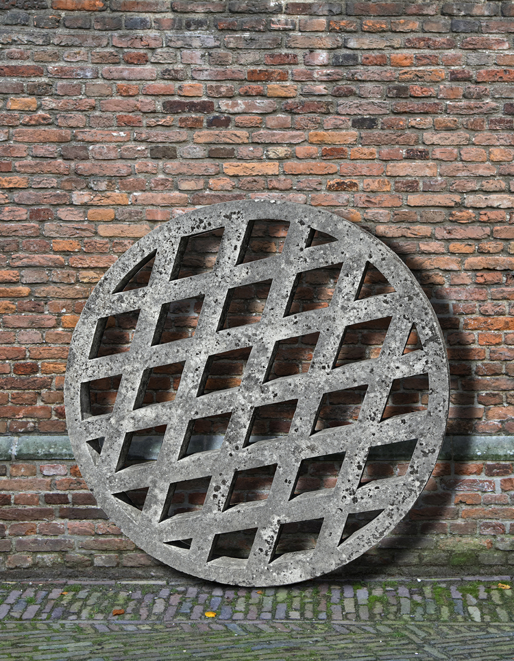A CARVED STONE WELL GRATE, LATE 20TH CENTURY