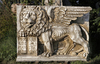 A SCULPTED MARBLE PLAQUE WITH THE VENETIAN LION OF SAINT MARK, LATE 20TH CENTURY, AFTER THE ANTIQUE