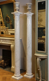 A PAIR OF VARIEGATED WHITE MARBLE COLUMNS, FIRST QUARTER 20TH CENTURY