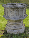 A CARVED LIMESTONE OCTAGONAL PLANTER, LATE 19TH CENTURY
