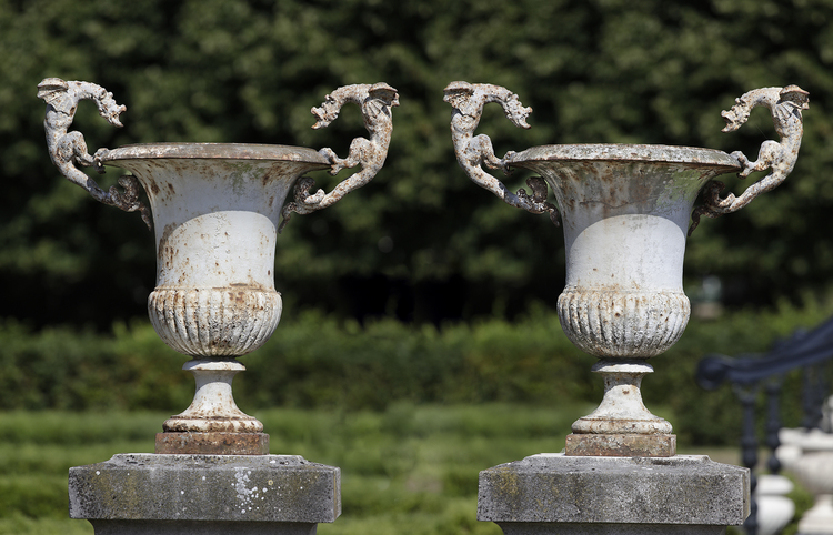 AN UNUSUAL PAIR OF FRENCH CAST IRON VASES WITH WINGED DRAGON HANDLES, THIRD QUARTER 19TH CENTURY