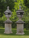 A PAIR OF CARVED LIMESTONE GARDEN URNS, SECOND HALF 20TH CENTURY