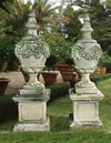 A PAIR OF CARVED LIMESTONE URNS AND COVERS IN 19TH CENTURY, STYLE SECOND HALF 20TH CENTURY