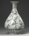 A CHINESE COPPER-RED PEAR SHAPED VASE, QING DYNASTY (1644-1911)