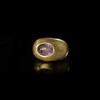 A PALEO CHRISTIAN GOLD RING WITH AN AMETHYST INTAGLIO, 4TH CENTURY AD
