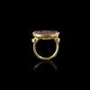A ROMAN GARNET INTAGLIO SHOWING A SHIP SET IN A MODERN RING, 1ST CENTURY AD, RING 20TH CENTURY