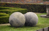 A LARGE PAIR OF LIMESTONE ORNAMENTAL SPHERES, LATE 20TH CENTURY