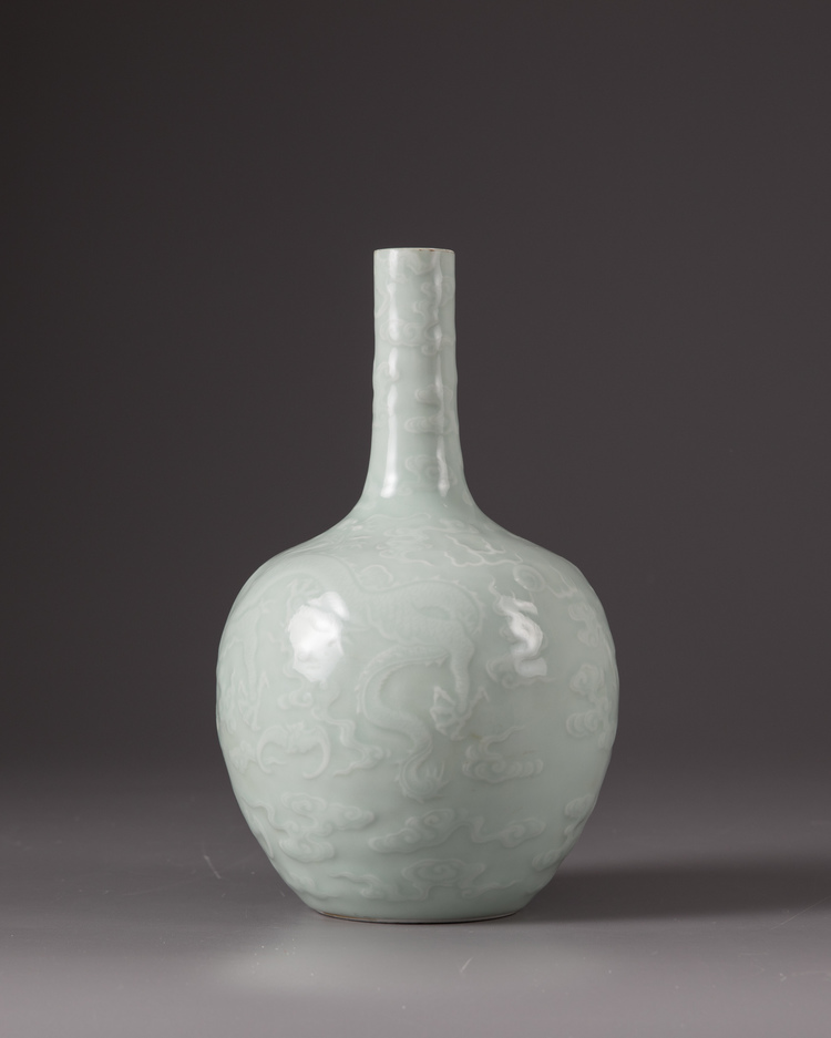 A celadon glazed bottle-vase