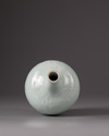 A celadon glazed bottle-vase