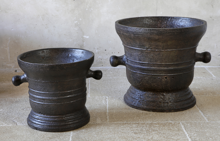 TWO SUBSTANTIAL CAST IRON MORTARS, PROBABLY 18TH CENTURY