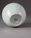 A celadon glazed bottle-vase