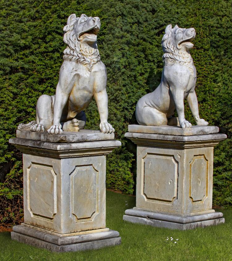A PAIR OF SCULPTED MARBLE MODELS OF MOLOSSIAN GUARD DOGS, SECOND HALF 20TH CENTURY, AFTER A 2ND CENTURY AD ROMAN MODEL KNOWN AS THE ‘JENNINGS DOG’ OR ‘THE DOG OF ALCIBIADES’