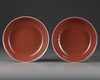 A PAIR OF CHINESE COPPER-RED-GLAZED DISHES, QING DYNASTY (1644-1911)