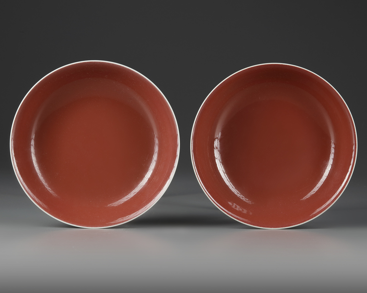 A PAIR OF CHINESE COPPER-RED-GLAZED DISHES, QING DYNASTY (1644-1911)