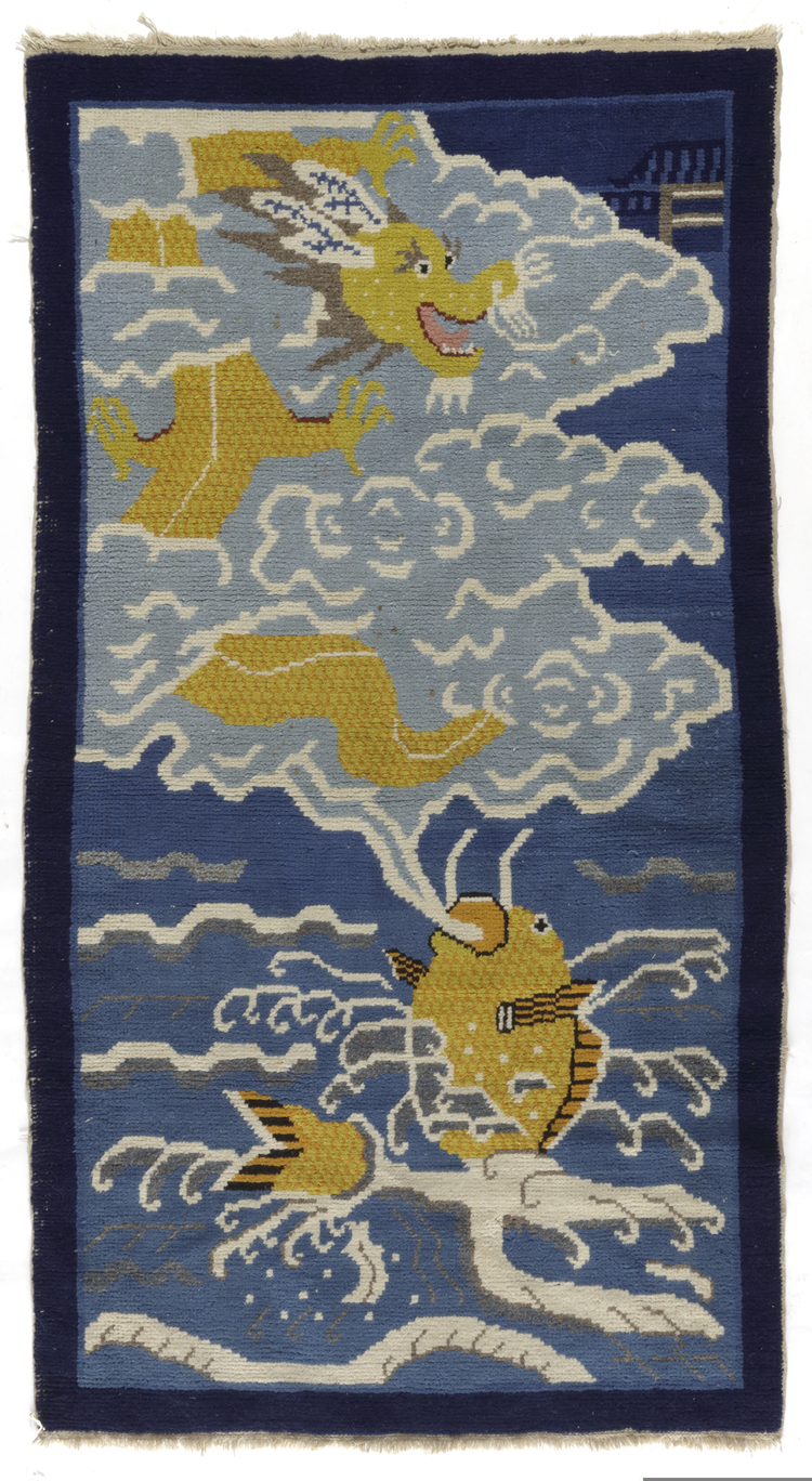 A CHINESE DRAGON AND FISH RUG, 20TH CENTURY