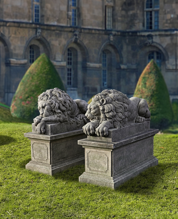 A PAIR OF SCULPTED LIMESTONE MODELS OF RECUMBENT LIONS,  SECOND HALF 20TH CENTURY, AFTER ANTONIO CANOVA (VENETIAN 1757-1822)