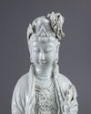 AN EXCEPTIONAL LARGE DEHUA GLAZED FIGURE OF A GUANYIN WITH A CHILD, 20TH CENTURY