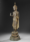 A GILT BRONZE STANDING FIGURE OF A BUDDHA, LATE 19TH CENTURY