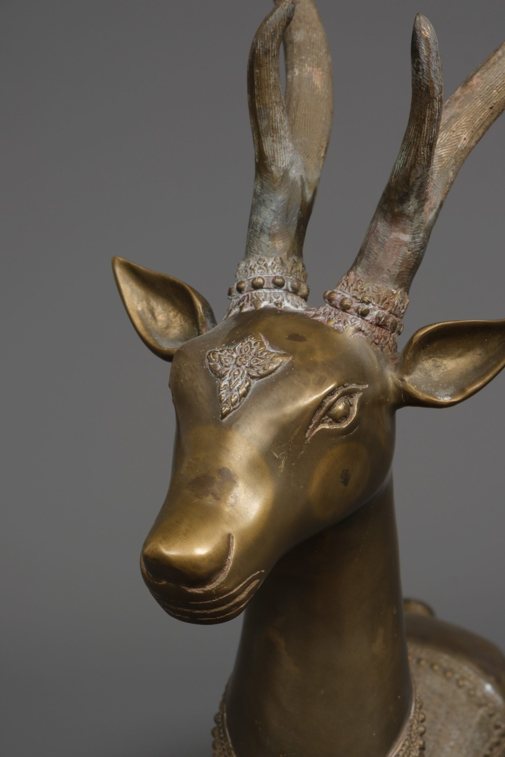 A LARGE THAI BRASS DEER SCULPTURE, MID 20TH CENTURY