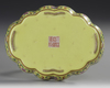 A CHINESE YELLOW-GROUND FAMILLE ROSE "TEA POEM" FOLIATE TRAY, QING DYNASTY (1636–1912)