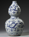 A CHINESE BLUE AND WHITE DOUBLE GOURD VASE, MING DYNASTY (1368-1644) OR LATER