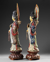 A PAIR OF CHINESE POLYCHROME PAINTED WOODEN CARVED FIGURES OF GUANYIN, EARLY 20TH CENTURY