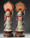 A PAIR OF CHINESE POLYCHROME PAINTED WOODEN CARVED FIGURES OF GUANYIN, EARLY 20TH CENTURY