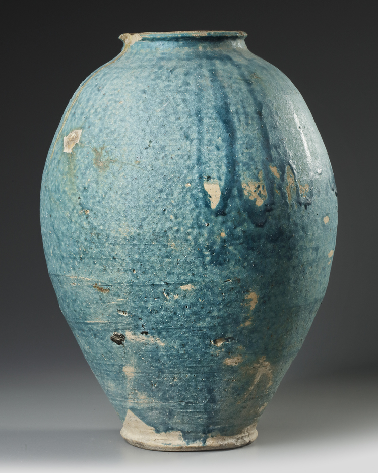 A LARGE POST SASSANIAN TURQUOISE GLAZED POTTERY STORAGE JAR, PERSIA, 6TH-8TH CENTURY