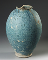 A LARGE POST SASSANIAN TURQUOISE GLAZED POTTERY STORAGE JAR, PERSIA, 6TH-8TH CENTURY