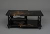 A JAPANESE LACQUER LOW TWO-TIERED DISPLAY TABLE, 1912-1926 (TAISHO PERIOD)