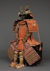 A JAPANESE GOLD LACQUER METAL SUIT-OF-ARMOUR (Ô’YOROI), SECOND HALF 18TH CENTURY (EDO PERIOD)