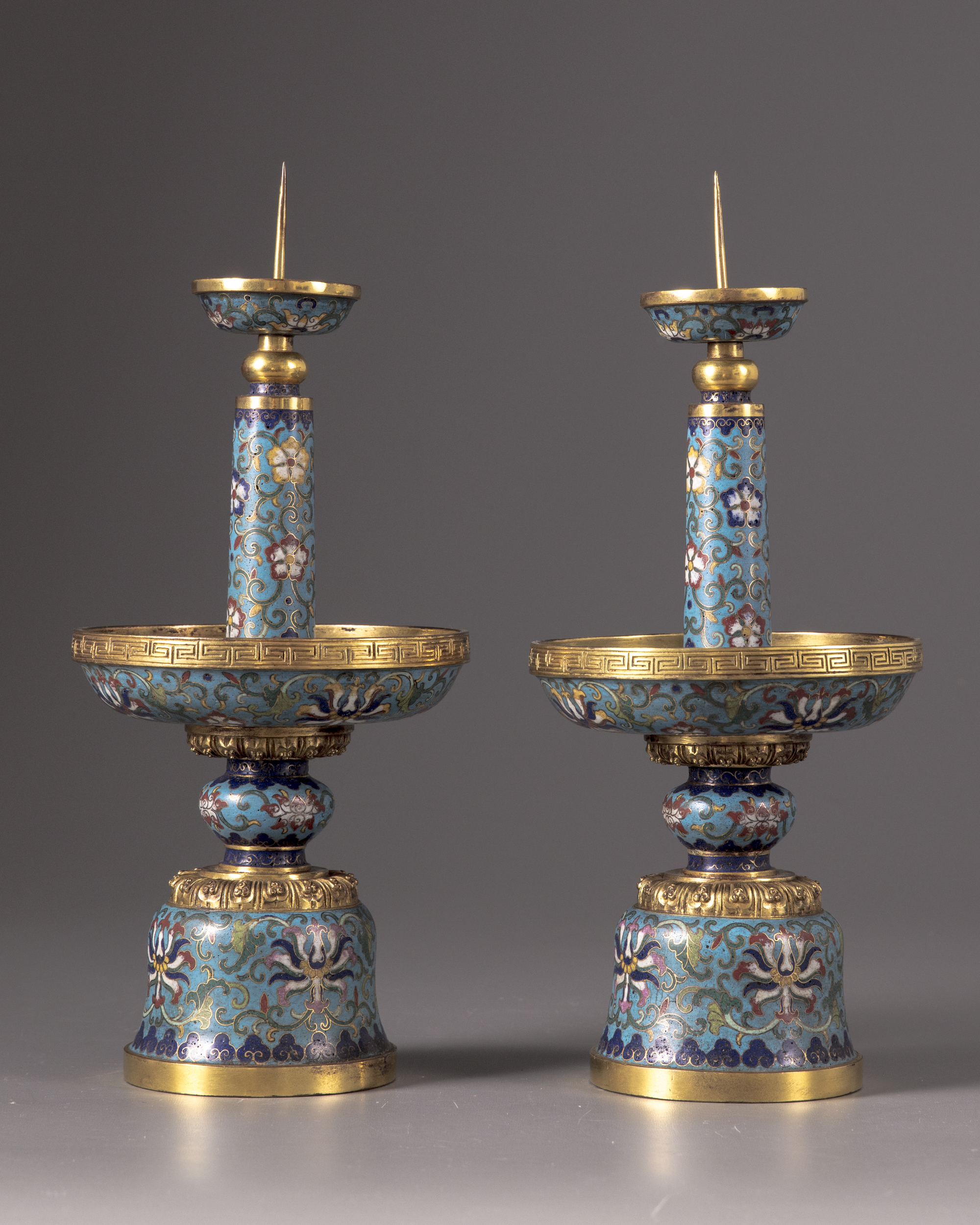 A pair of Chinese cloisonné candle-stands