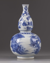 A blue and white double gourd vase