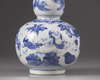 A blue and white double gourd vase