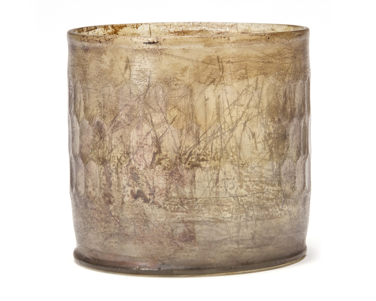 A PERSIAN CUT GLASS CUP, 8TH-9TH CENTURY