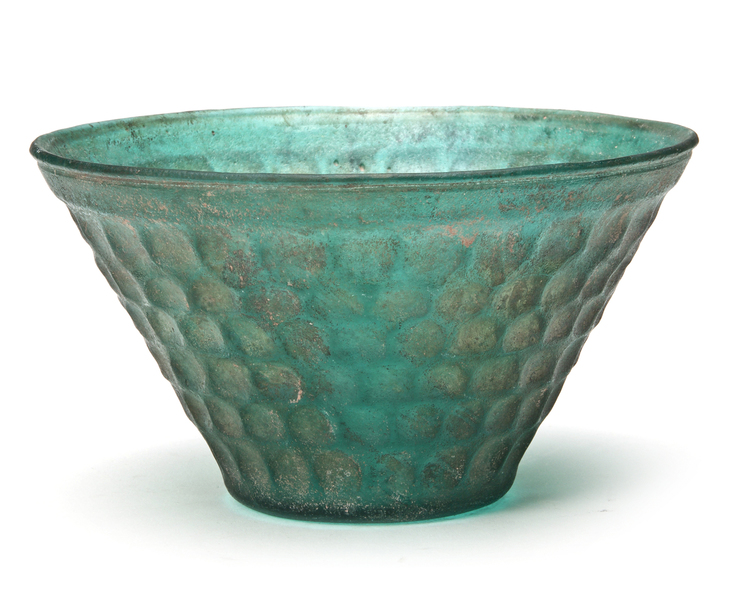 A PERSIAN GREEN CUT GLASS BOWL, 9TH-10TH CENTURY
