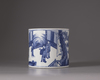 A CHINESE BLUE AND WHITE BRUSH POT, QING DYNASTY 1644-1911